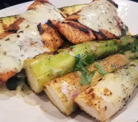 California Fish Grill - Palmdale, CA. Garlic butter salmon with asparagus and zucchini