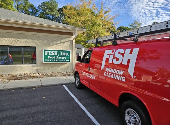 Fish Window Cleaning - Newport News, VA. Fish cleaning the windows of the Fish, Inc Food Pantry