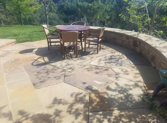 Carolina Oasis, LLC. - York, SC. Hand Cut Stone Patio with Retaining Wall