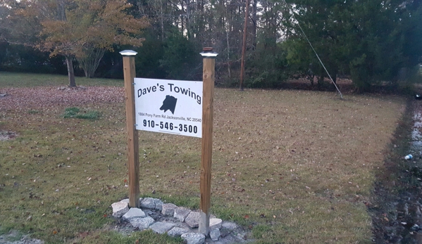 Dave's Wrecker Service. Sign at the road on Pony farm