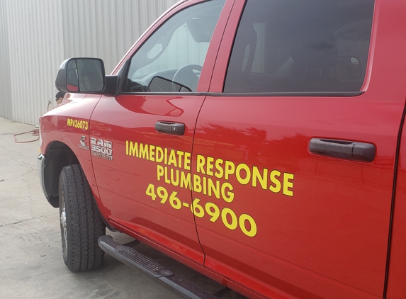 Immediate Response Plumbing - San Antonio, TX. Bright red truck
