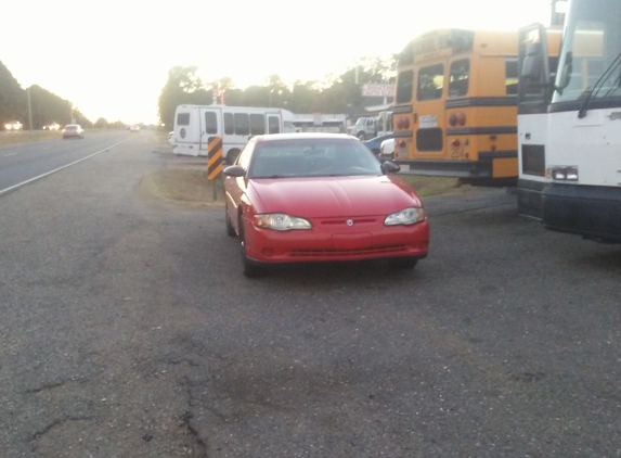 Wolf's Towing - Shreveport, LA. Then its next to the road and in front of the other shops cars.