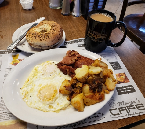 Mayor's Cafe & Bagel Emporium - Pembroke Pines, FL. Bill Lewis of Vero Beach enjoying breakfast at Mayor's Cafe & Bagel Emporium in Pembroke Pines, Florida.