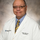 Damian Collins, MD