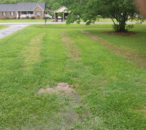 Vaughan Well & Septic Tank Service - Washington, NC. He was supposed to make the yard level. I had to do it myself. We paid him for landscaping.