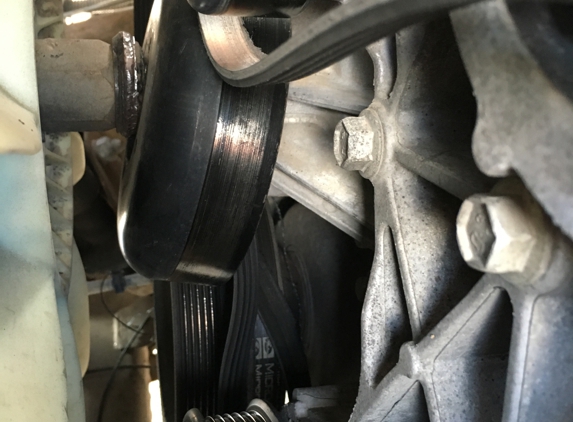 E & R Automotive - Midland, TX. Broken water pump pulley.