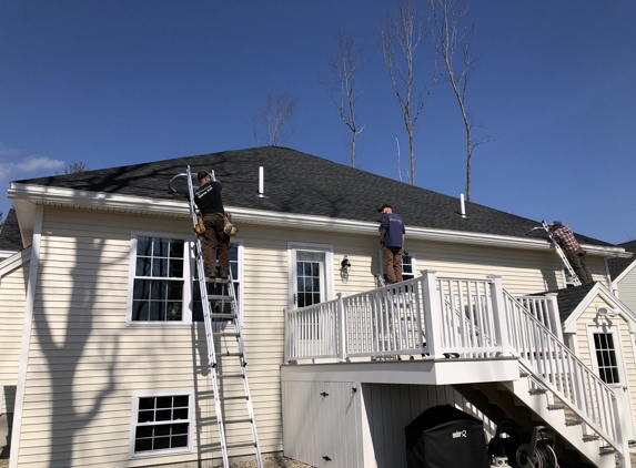 GutterPro, Inc. - South Portland, ME. Installing seamless gutter on home in Portland Maine