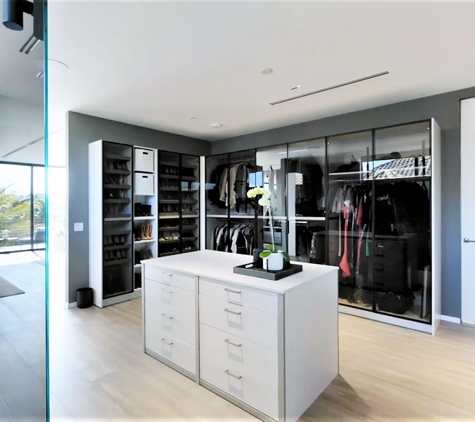 VelArt Designer Kitchens & Baths - Miami, FL. His & Hers Walk-in Closet by VelArt