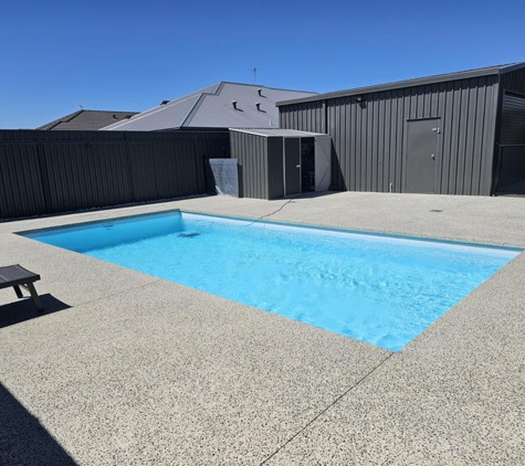 Crusader Concrete - Ravenswood, WA. The seamless pool area supplied, laid, and honed by Clint and the boys at CrusaderConcrete.