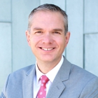 Dr. John Larsen Clayton, MD