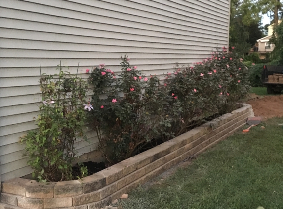 Woodburn Landscape - Langhorne, PA. LABOR DAY WEEKEND 2019 WORKING TO INSTALL BLOCK WALLS ALONG BOTH SIDES OF HOUSE -Just Finished but not cleaned up yet!