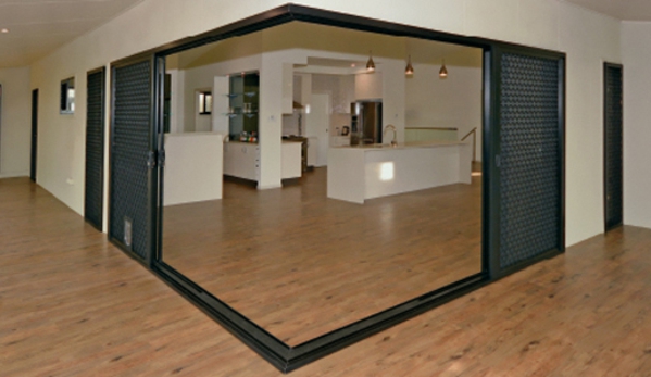 Bradnam's Windows & Doors - Gladstone Central, QLD. Black Aluminium Corner Sliding Door