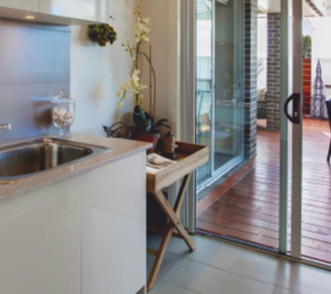 Bradnam's Windows & Doors - Urraween, QLD. Ultra Silver Aluminium Sliding Door