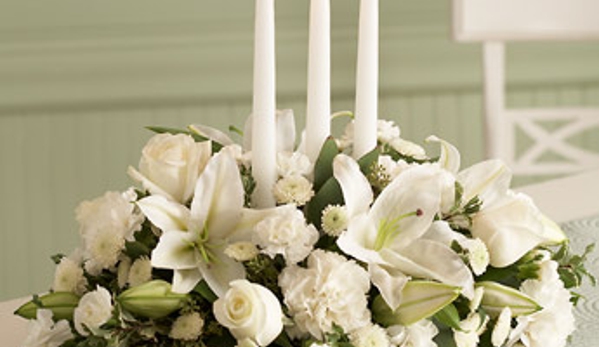 Miami Beach Flowers®, a Surf Florist, Inc Company - Miami Beach, FL. Traditional White Centerpiece with Candles