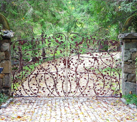 Tri State Gate - Bedford Hills, NY. Custom-designed ornate wrought-iron driveway gate by Tri State Gate, Bedford Hills, New York