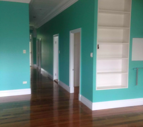 Bradford Painting Contractors - Oxenford, QLD. Bright colours & contrasting trims requires skill & a steady hand