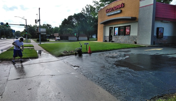 Ferrell and Son's Residential Property Maintenance. Powerwashing Taco Johns