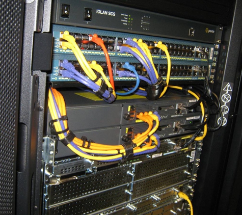 Computer Networking Solutions - Tacoma, WA. 1 of 2 cabinets with equipment I installed at Westin Bldg (Seattle)