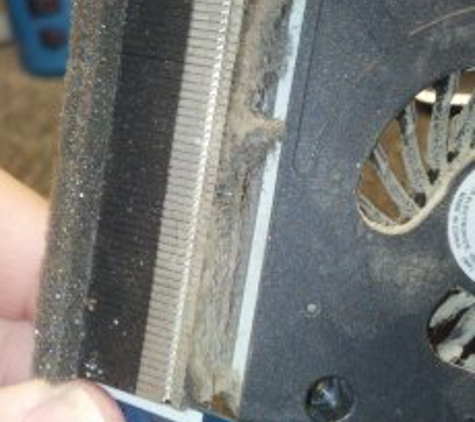 Computer Repair King LLC - Sun City West, AZ. Plugged up exhaust fans causes burning away of the CPU grease that keeps it cool.