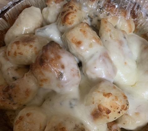 Luv'n Oven - Cooper City, FL. Garlic knots with cheese