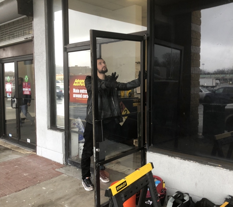 AGC Glass Contractors - Alexandria, VA. Aluminum dark bronze double door replacement