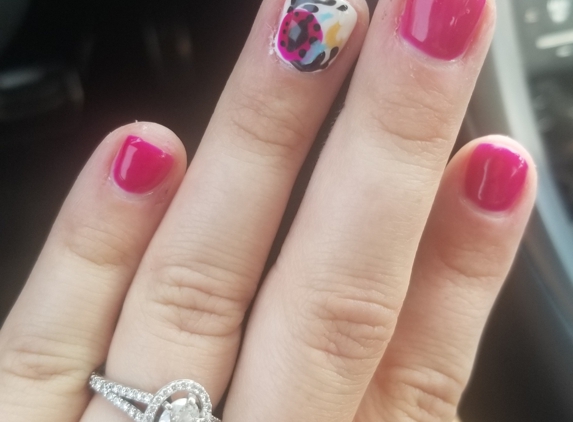 Vv Nails and Spa - Greeley, CO. What I received.... very disappointing. Sloppy, and she painted over the nail dust, so there are bumps all over my nails