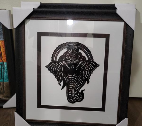 Rococo Framing - Newtown, NSW. Ganesh is also leather.