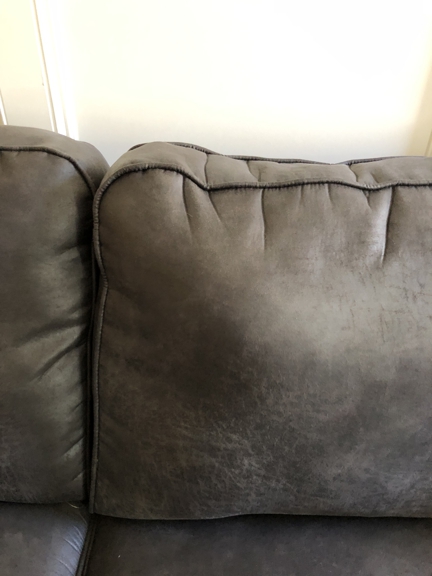 Gallery Furniture - Houston, TX. My couch has a pimple. ����