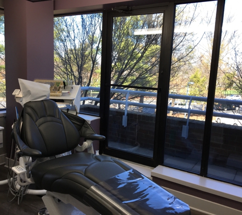Oakton Family Dentistry - Oakton, VA. All the patient rooms have large windows and chairs with massagers and warmers built into them