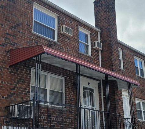 Metropolitan Awning Company - Woodhaven, NY. Aluminum home awning