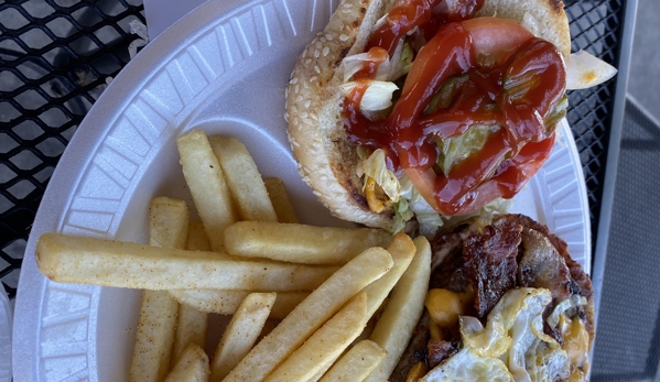 Canada Steak Burger - San Diego, CA. 8oz cheeseburger deluxe with bacon & egg, with their delicious fries.