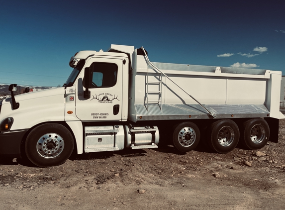 Lake Creek Trucking - Heber City, UT. Logo on, Hauling rocks today