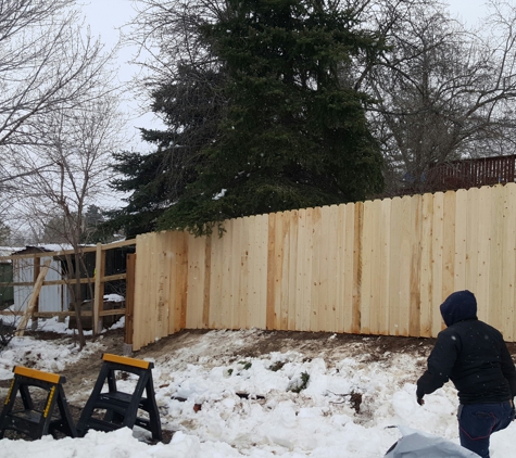 KSG Fence Company - Littleton, CO. Working in the snow. 
Rain, Snow or Shine if you need a fence we have the time.