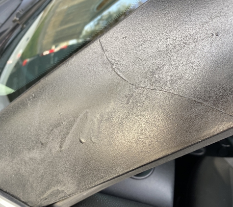 Mobile Auto Glass OC - Irvine, CA. Glued and spray painted repair! Horrible!