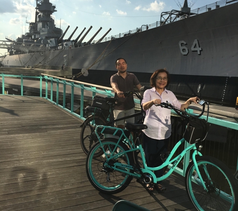 Pedego Electric Bikes Norfolk - Norfolk, VA. The Battleship Wisconsin is a favorite stop along the Elizabeth River Trail.