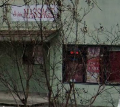 Asian Relax Massage - Chico, CA. From the side street. The leaves are off the trees so you can see the building.
Asian Relax Massage