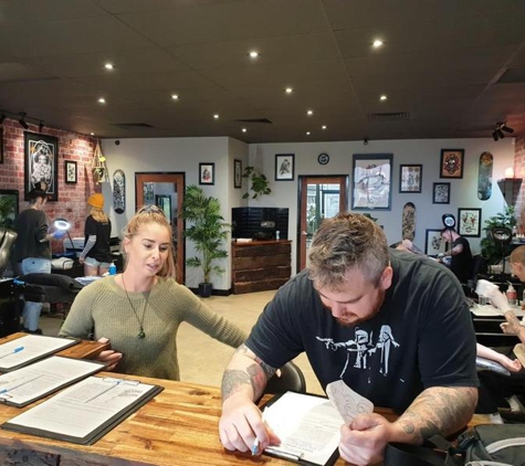 Beyond The Illusion Tattoo Parlour - Secret Harbour, WA. Beyond the Illusion Tattoo Parlour Secret Harbour, front desk friendly service, clean modern surroundings