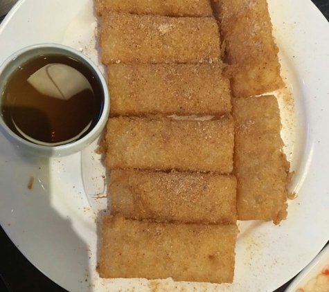 Mei Zhou Dong Po Restaurant - Los Angeles, CA. Fried sticky rice with cinnamon and sugar coats