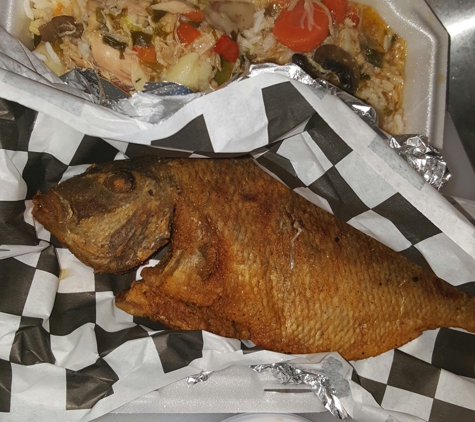 Next Step Soul Food Cafe - Dorchester Center, MA. Porgy, rice with stewed Chicken with a side of Candied yams