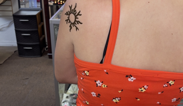 Egyptian Henna Tattoos, Hair Wraps & Airbrush Tattoos - Kissimmee, FL