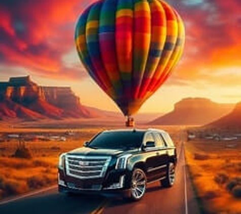 Zia Black LLC - Albuquerque, NM. Black SUV and a Hot Air Balloon