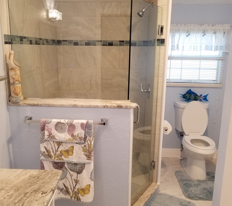 Isles Tile & Stone,  LLC - Punta Gorda, FL. My guest bathroom. They did a awesome job and very reasonable prices.