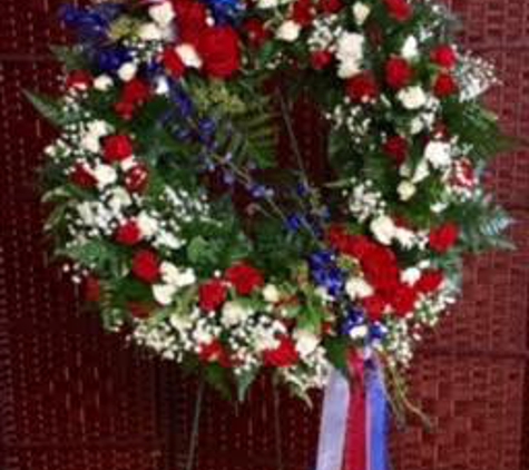 FlowerBell - Reno Sparks Florist - Reno, NV. Heros Wreath by FlowerBell