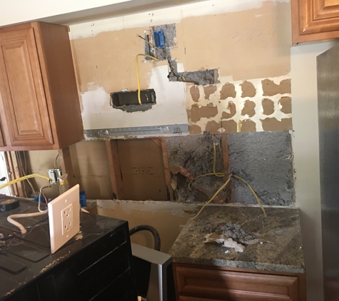 Absolute Home Renovations - N Royalton, OH. Had to remove the other section of tile, move electrical, remove and repair cabinets that Absolute Home Renovations installed