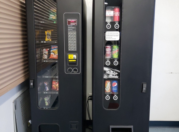 Wildcat Laundry & Dry Cleaning - Tucson, AZ. Snack machines available.