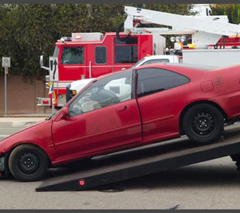 Burgess Paint 'N' Panel. 24 hrs Towing Available