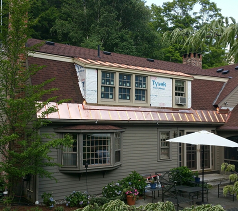 J Smegal Roofing & Renovations - Pittsfield, MA. Copper ice slides/standing seam