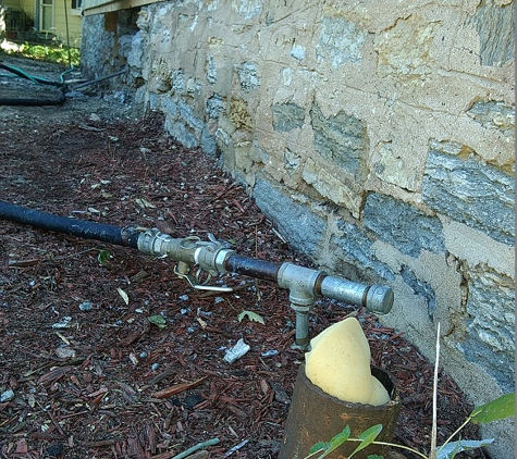Great Lakes Waterproofing - Minneapolis, MN. Working on an old rubble wall foundation with exterior bentonite injections