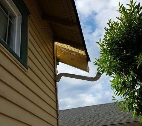 American Building Solutions - Tacoma, WA. Tore down the gutters and left them lying in the yard when he quit.