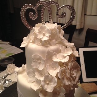 Chukwa' - Los Angeles, CA. Fondant Wedding cake with Vanilla bread and chocolate filling